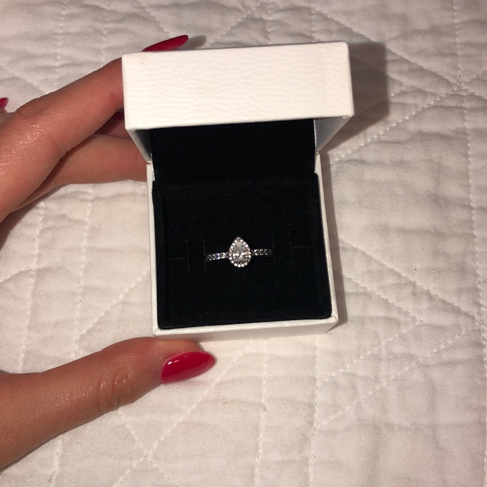 Pandora tear drop ring with case.